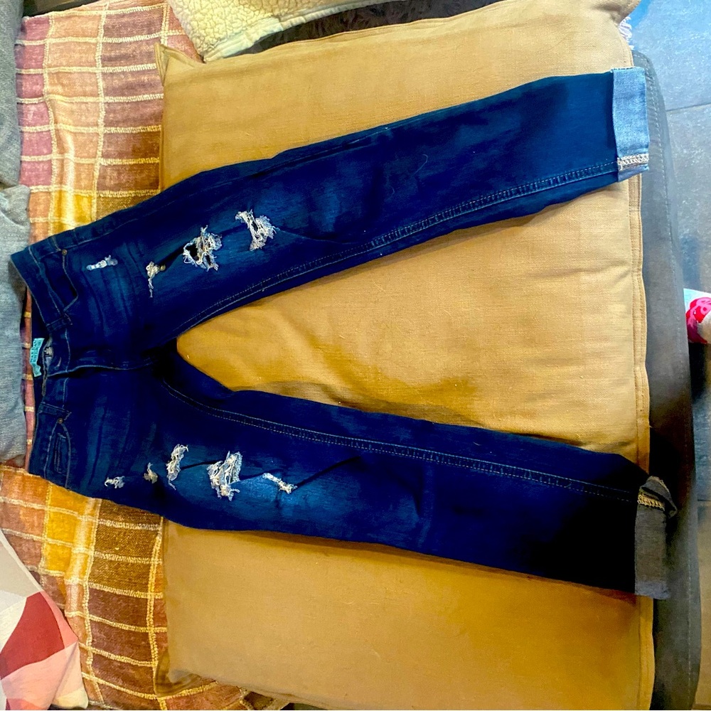 Distressed Blue Jeans
